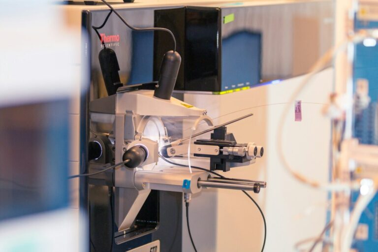 Mass spectrometer in a laboratory used to illustrate peptide purity and identity testing